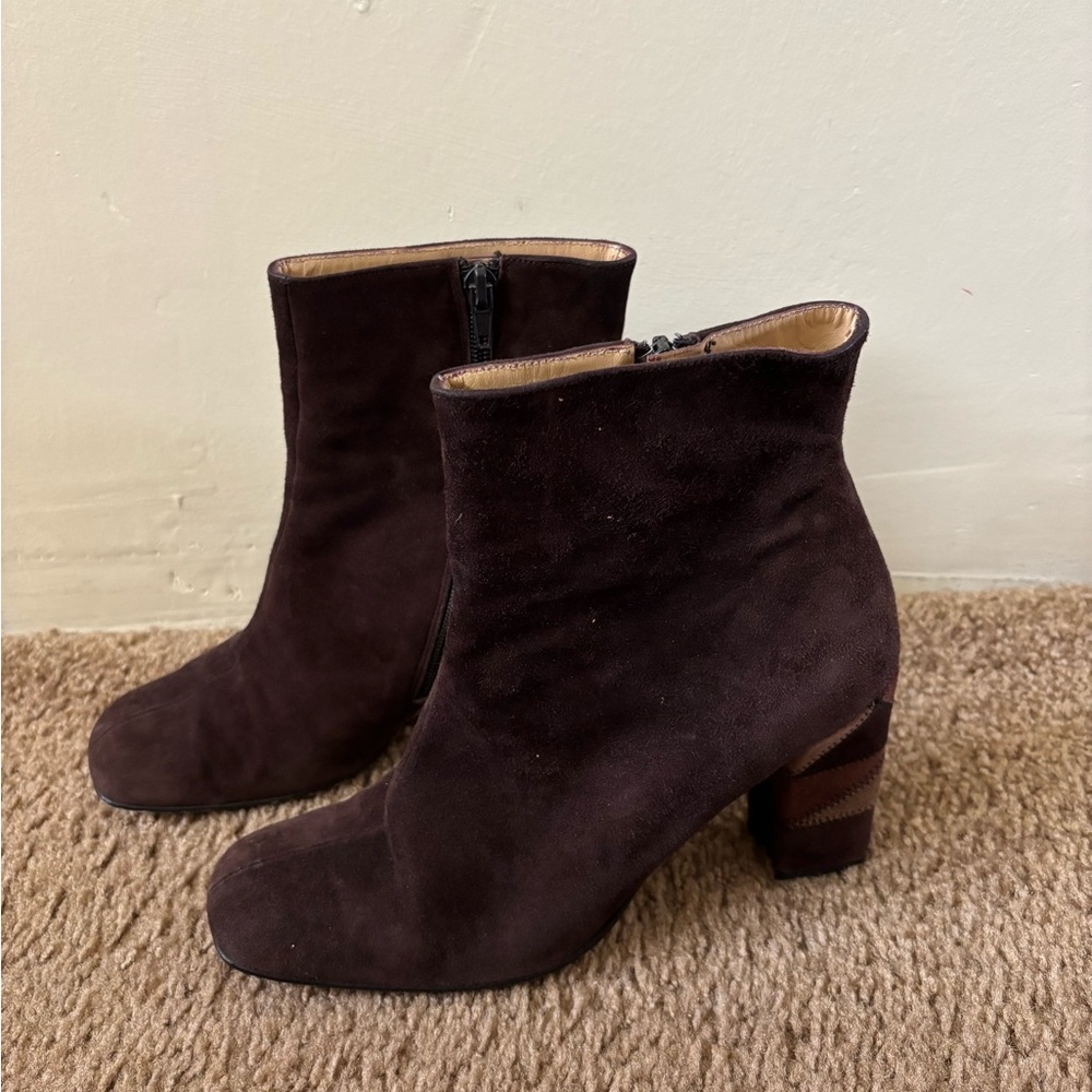 Coupe d'etat suede booties with patchwork heels